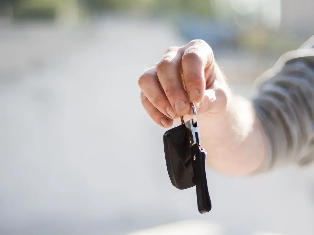 Handing over a car key